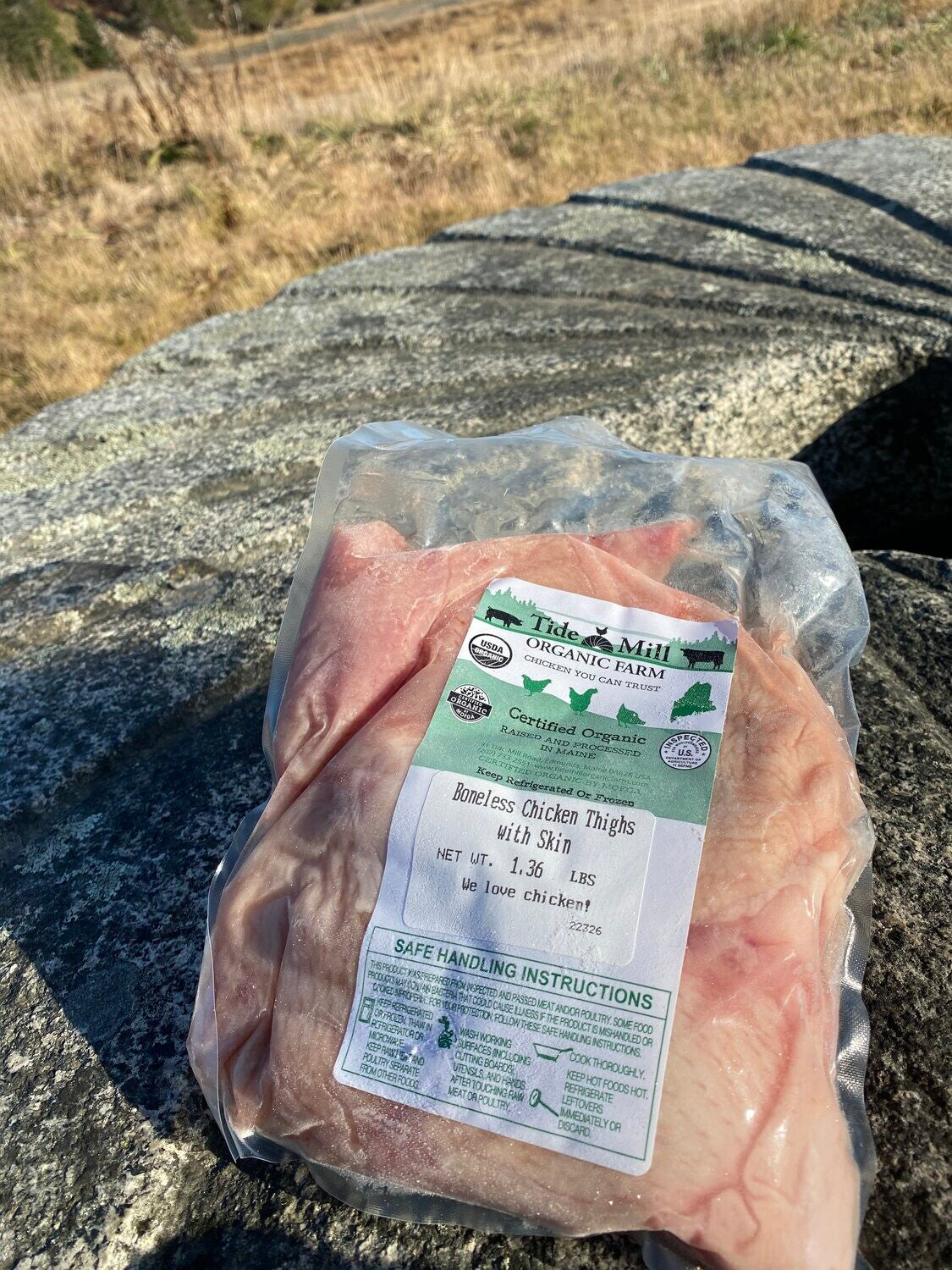 A package of boneless organic chicken thighs