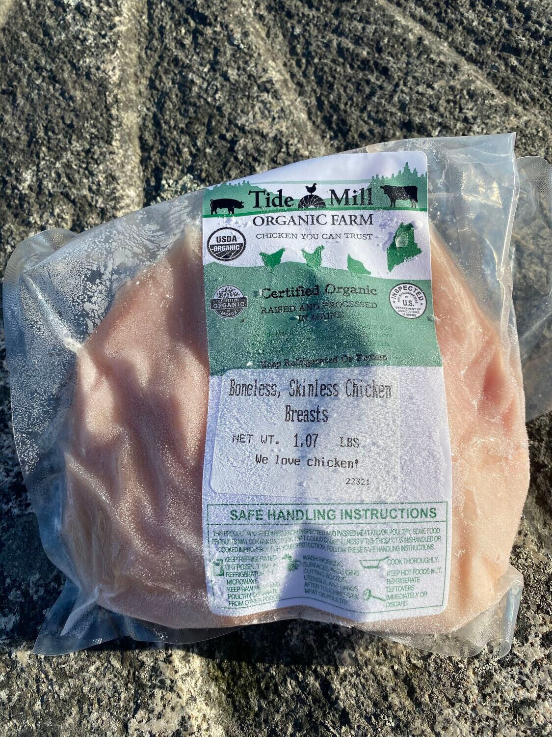 A package of boneless skinless organic chicken breasts