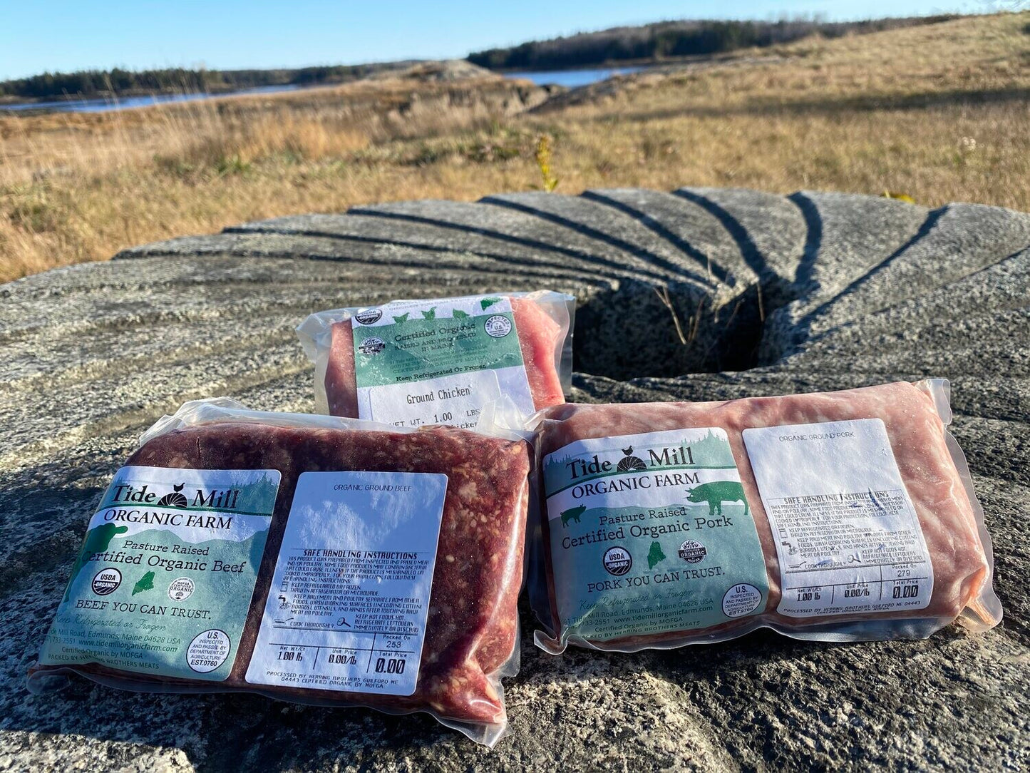 Packages of organic ground chicken, pork, and beef